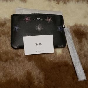 coach wristlet with stars